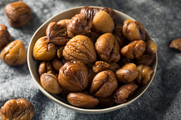 istock Organic Shelled Roasted Chestnuts 1195112367