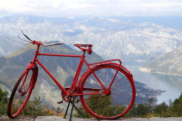 istock red bike in the mountains 1195117772
