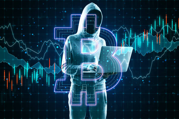istock Cryptocurrency and hacking concept with no face hacker with laptop and bitcoin sign. 1195117786