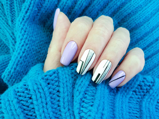 istock female hand nails beautiful manicure sweater 1195122613