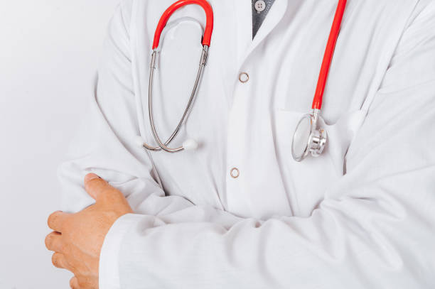 istock Confident young male doctor wearing red stethoscope.