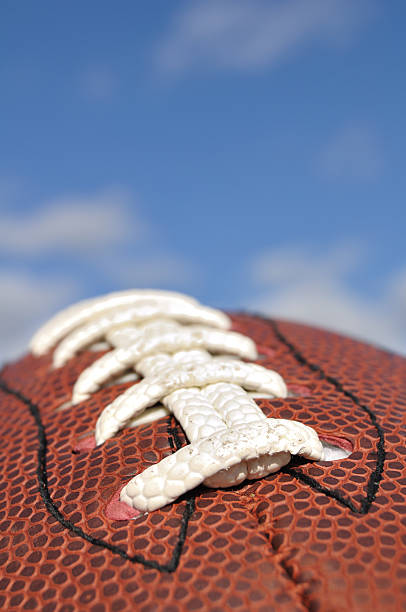 Close-up of American Football Texture and Laces stock photo