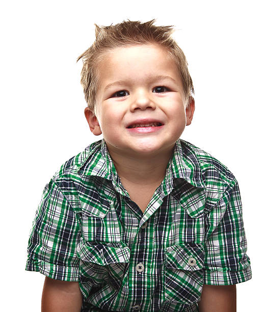 Cute little boy smiling for the viewer stock photo