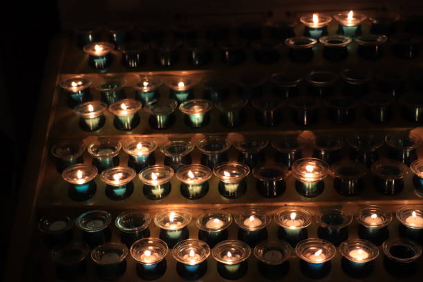 istock Votive candles in a church 1195140908
