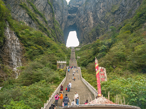 zhangjiajie/China-15 october 2018:Crowd of tourist Climbing Heaven gate cave stairs on tianmen mountain national park at Zhangjiajie city china.Tianmen mountain the travel destination of Hunan zhangjiajie city China