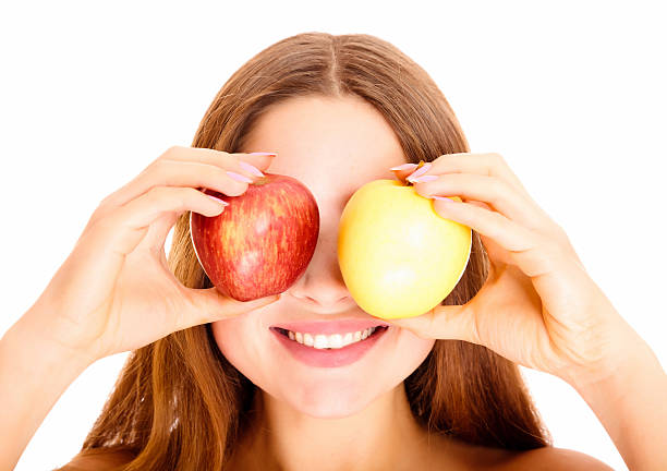 istock Smiling girl with apples 119515429