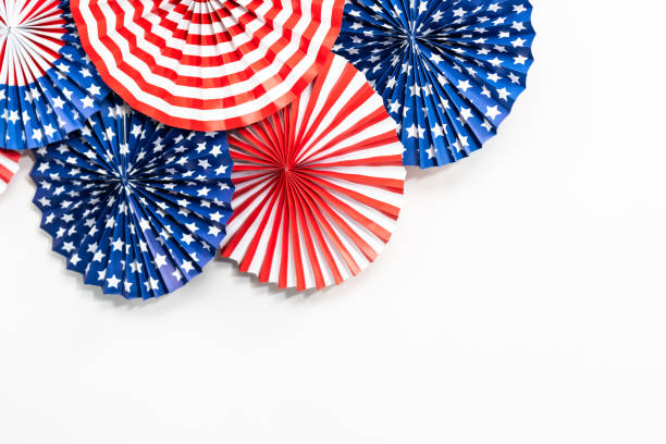 istock Red, white, and blue paper fans for July 4th celebration. 1195156429