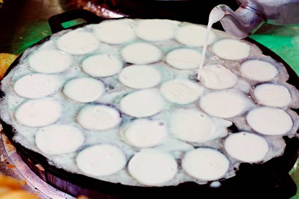 istock Cooking coconut milk pancake - Thai sweet dessert. 1195157319
