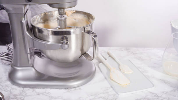 istock Mixing ingredients in standing kitchen mixer to bake funfetti cake. 1195158359