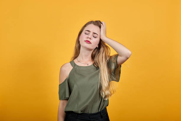 istock Relaxed woman keeping eyes closed, with hand behind head 1195160010