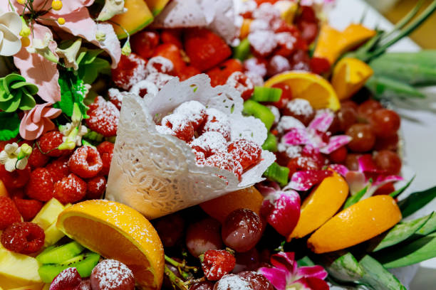 Fresh mixed healthy fruits on festive table.