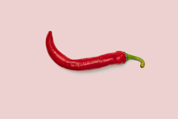 istock red hot pepper flat lay isolate on the flat surface, minimalist concept, pastel color 1195161787