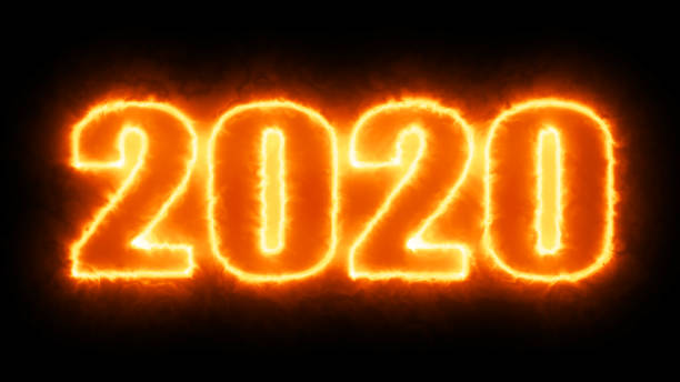 istock Burning new year 2020 font on black background 1195163787