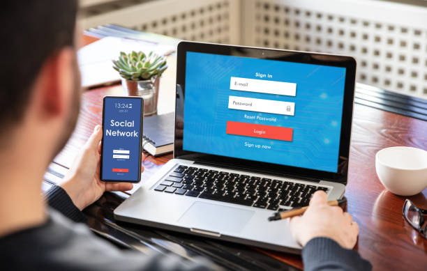 istock Internet security concept. Login password on laptop and smartphone screens 1195164437