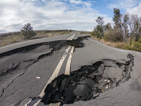 Cracked road from volcano activity in Volcano national park, Hawaii , USA