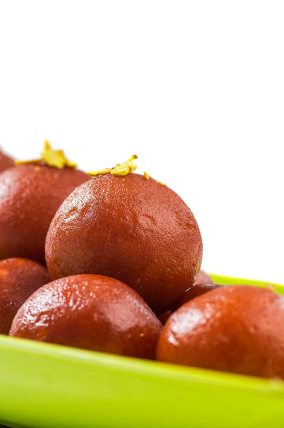 istock Indian Dessert Gulab Jamun. Sweet Dish isolated on white background 1195174276