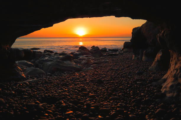 istock Sea cave under Beer Head 1195174518