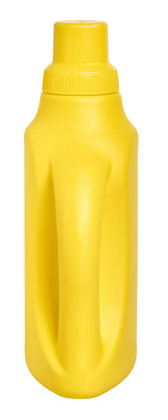 istock yellow detergent plastic bottle with measuring cap and cleaning liquid isolated on white 1195179452
