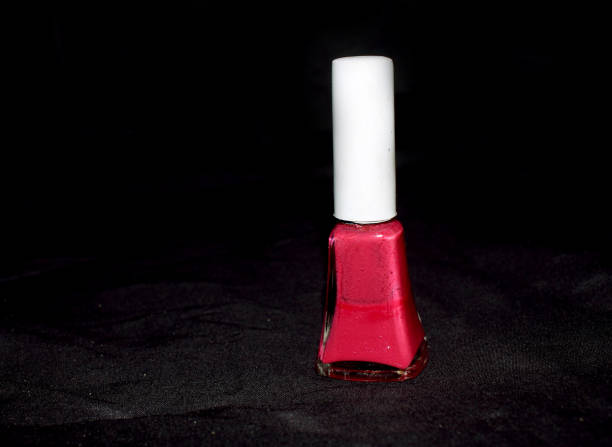 istock red nail polish bottle cosmetic product 1195180656