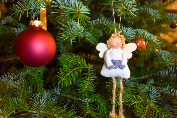 istock Christmas ornaments on christmas tree. 1195181360