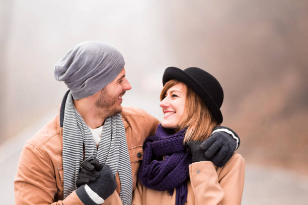 istock Couple enjoying outdoors in cold autumn / winter time. 1195181458