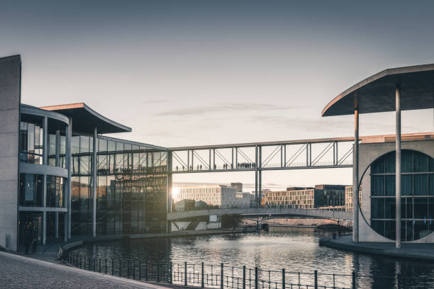 istock people on bridge  in the government district in Berlin 1195183665