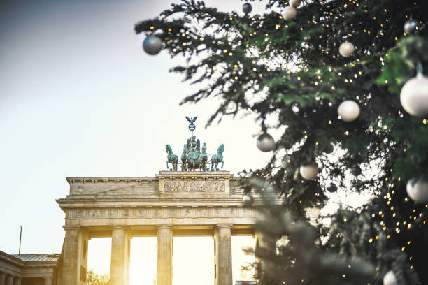 istock Brandenburger Tor behind christmas tree 1195183959