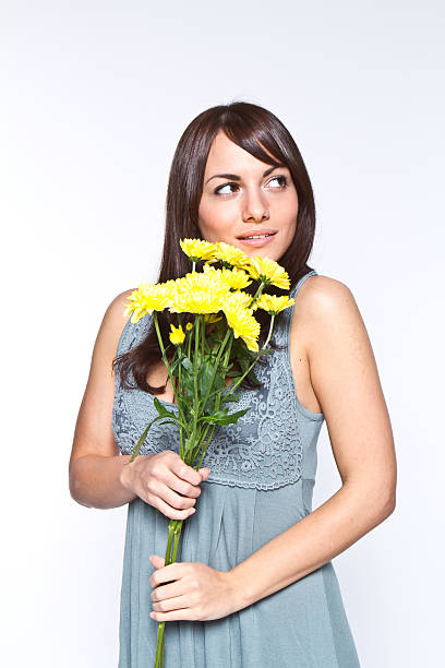 istock young woman with flowers 119518459