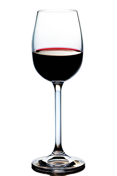 single glass filled with red wine isolated on white stock photo
