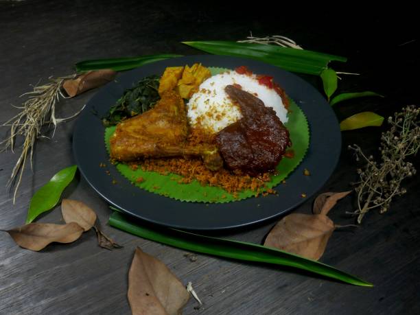 istock Padang rice, grilled chicken and rendang 1195188633