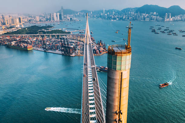 Bridge in Hong Kong and Container Cargo freight shipHongkong, China