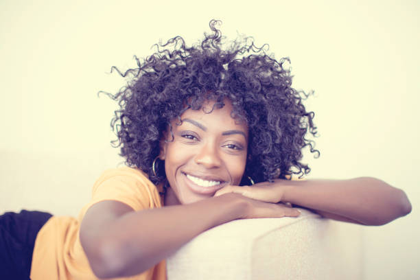 istock Young woman resting on the sofa 1195190938