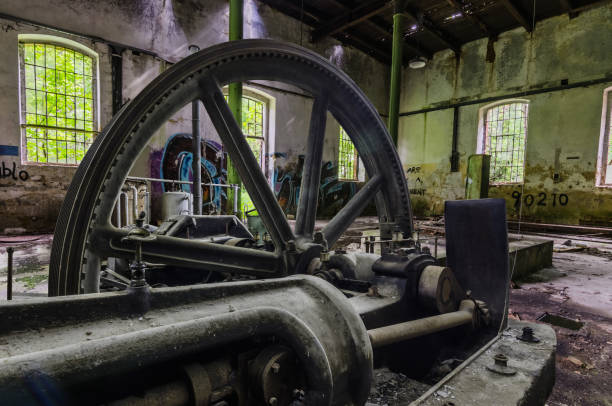 istock huge wheel in an factory building 1195190958