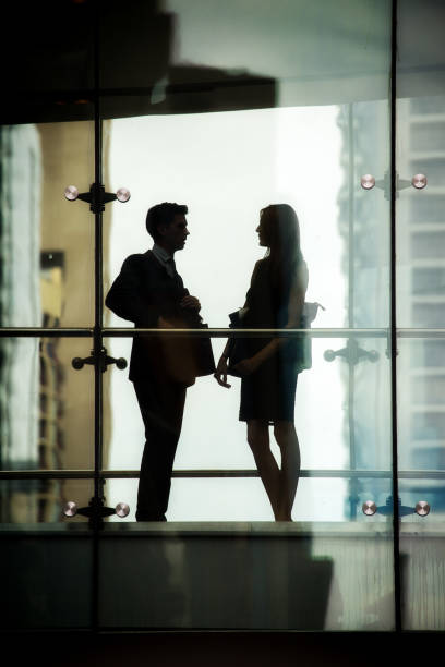 istock Two business people on elevated wlakway 1195193470