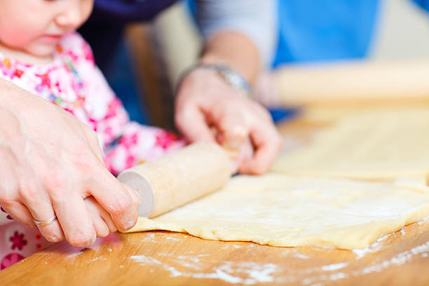 istock Closeup of family baking pie 119519889
