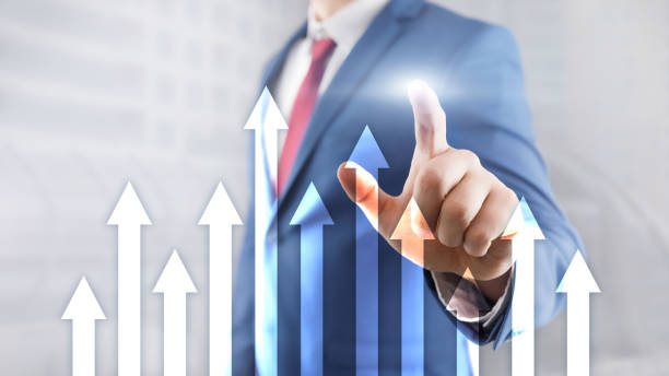 istock Up arrow graph on skyscraper background. Invesment and financial growth concept. 1195199767