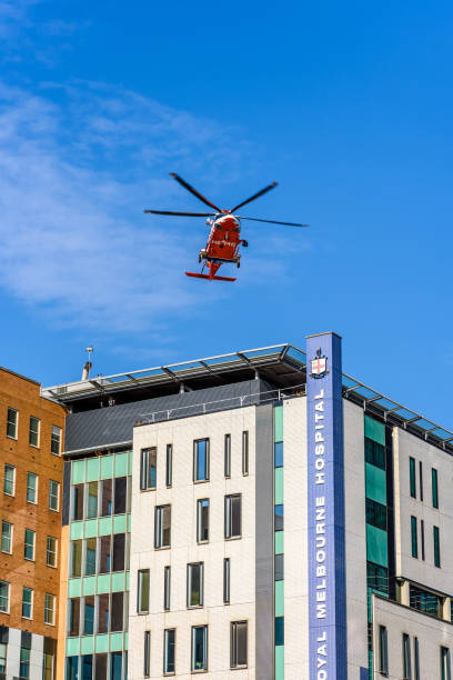 Royal Melbourne Hospital Helicopter Melbourne, Victoria, Australia, December 17th, 2019: The emergency ambulance Helicopter is landing on the rooftop of the Royal Melbourne Hospital. landing craft stock pictures, royalty-free photos & images