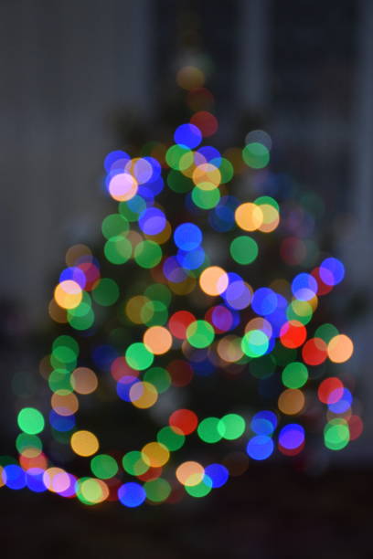 istock different colours of garland light on Christmas tree 1195203281