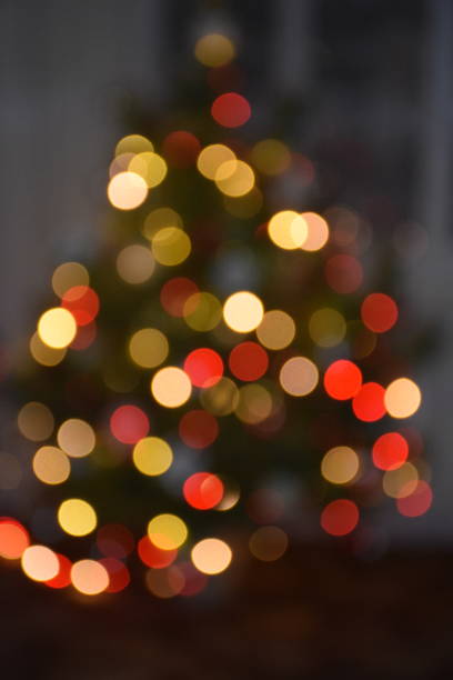 istock different colours of garland light on Christmas tree 1195203282