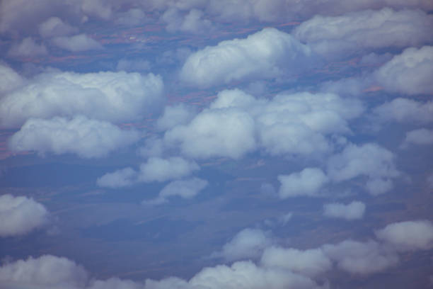 istock Sky views with clouds from an airplane 1195204917