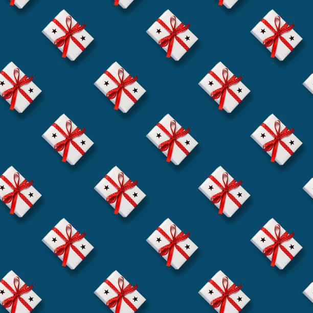 istock Seamless pattern with white box on classic blue background. Xmas gift. Happy New year. 1195204992