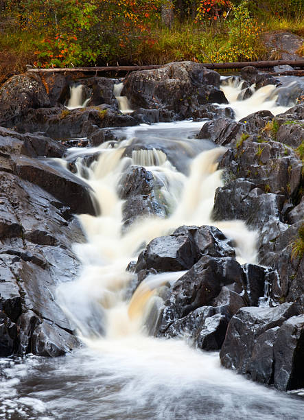 istock mountain waterfall. fast stream water. autumn landscape 119520762