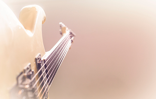 Electric guitar stratocaster sunburst closeup, macro abstract