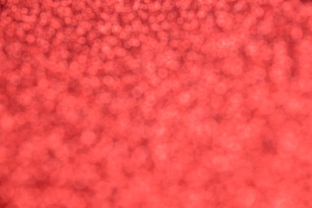 beau fond rouge festif avec les sequins brouillés - star trail galaxy pattern star photos et images de collection