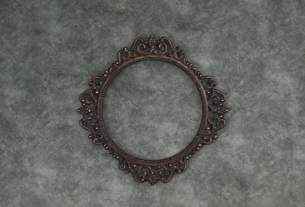 istock vintage victorian bronze round frame on a green background 1195215148