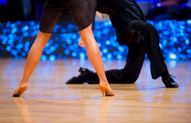istock Low Section Of People Dancing On Hardwood Floor 1195225366