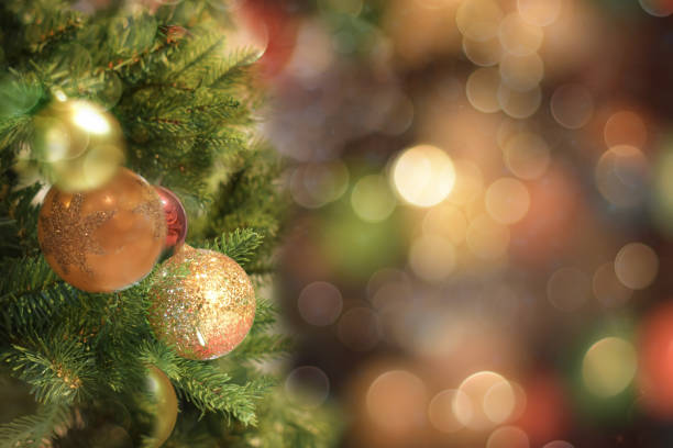 istock Christmas tree background with bokeh defocused lights. 1195231722