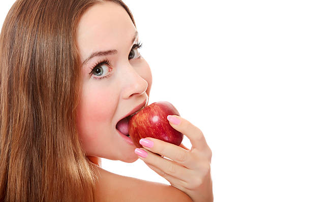istock Girl eating an apple 119523332