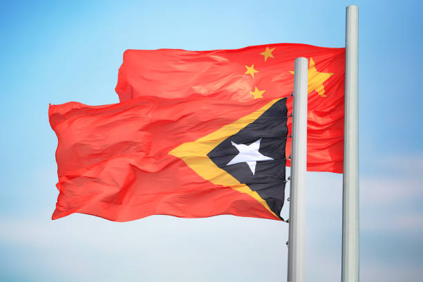 istock Flags of East Timor and China 1195233354