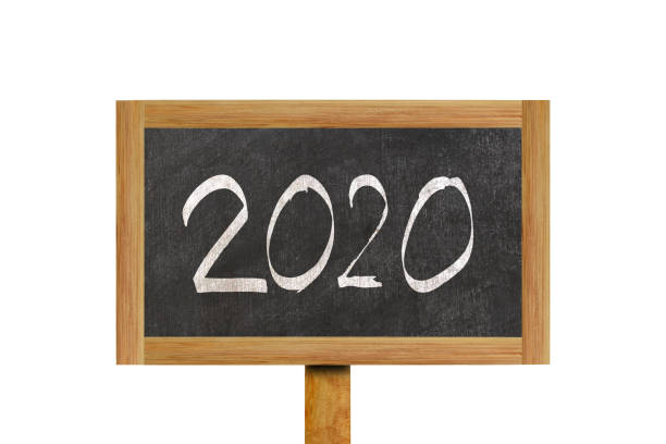 istock 2020 written on wood board isolated on white. 1195234322